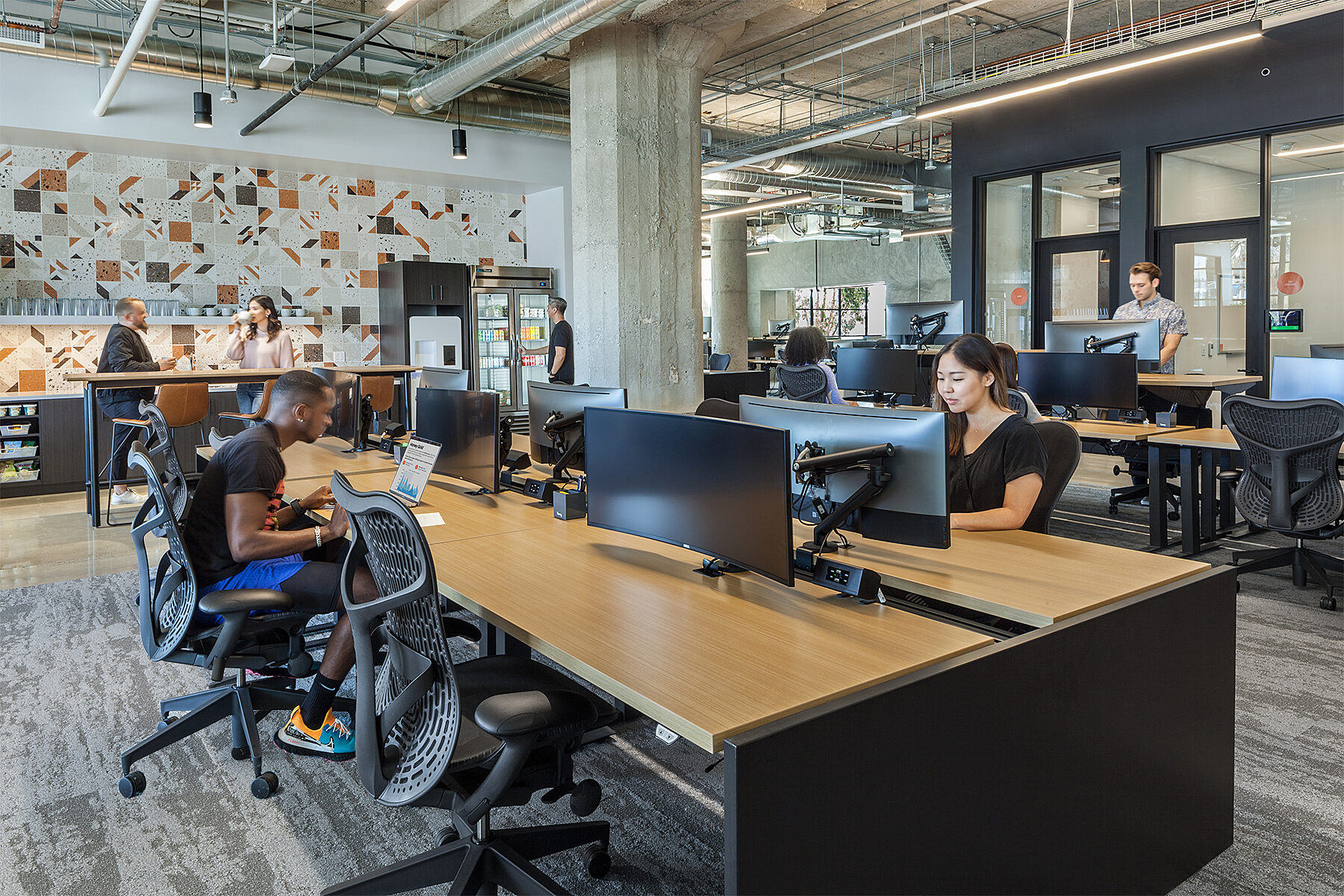 modern open workspace with various height desks