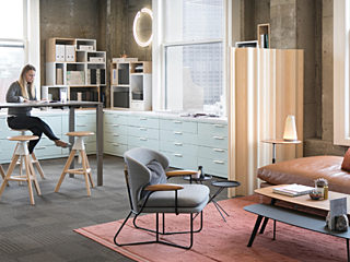 SF office with modern seating, desk, and storage space
